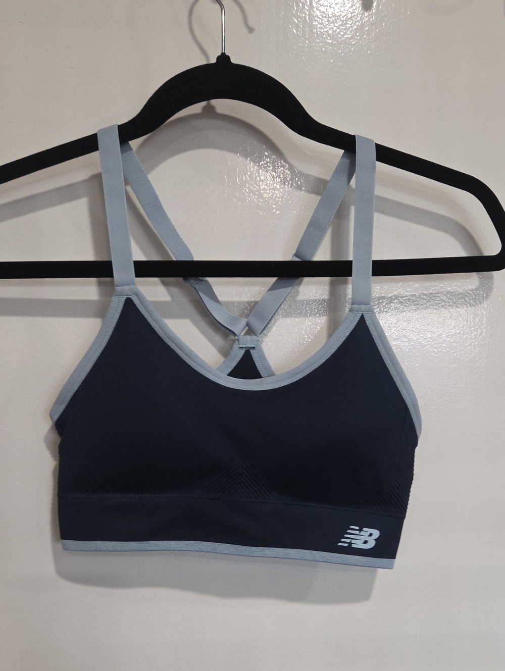 New Balance Navy Sports Bra with Light Blue Trim. Size small